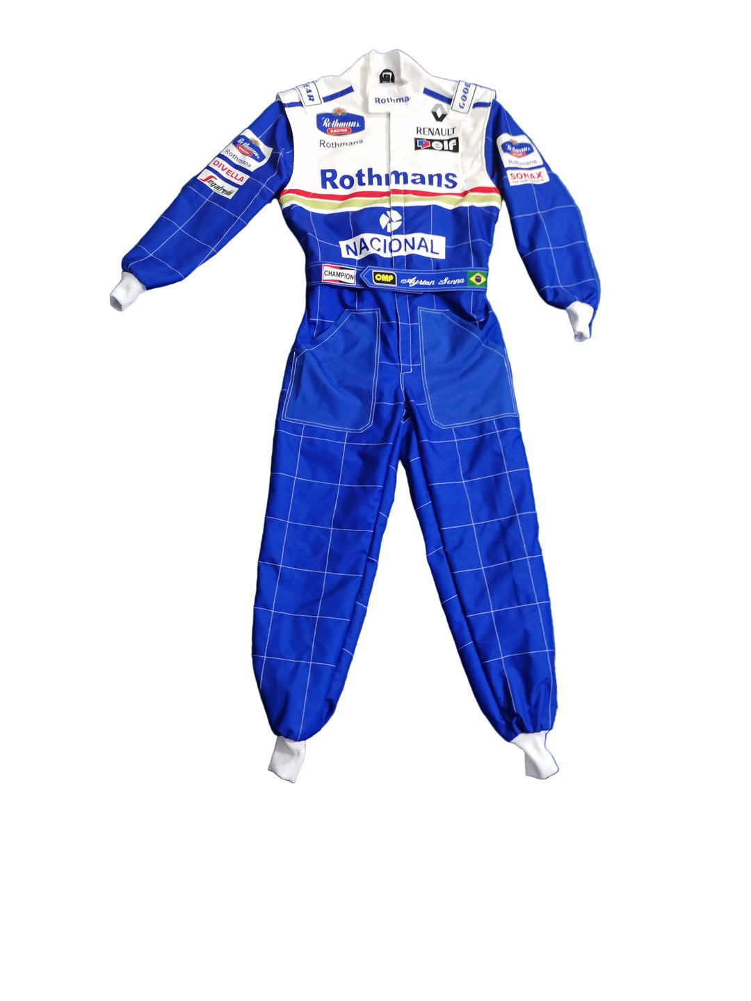 A blue and white long-sleeve racing suit laid flat on a wrinkled blue sheet, with visible sponsor logos including Rothmans, National, and BMW. Bare feet are visible at the bottom corners.