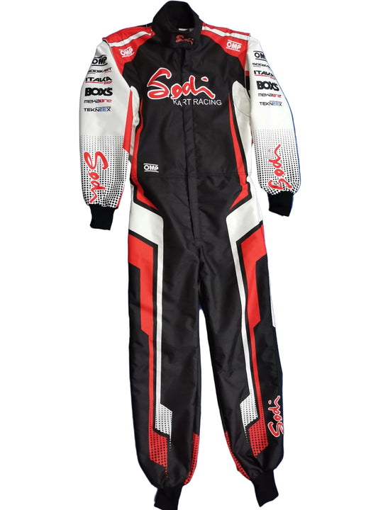 A full-body black, white, and red racing suit laid flat on a blue fabric background. The suit features the 'Soda Fast Racing' logo on the chest and sleeves, with sponsor logos including BOXS and TYREKE.