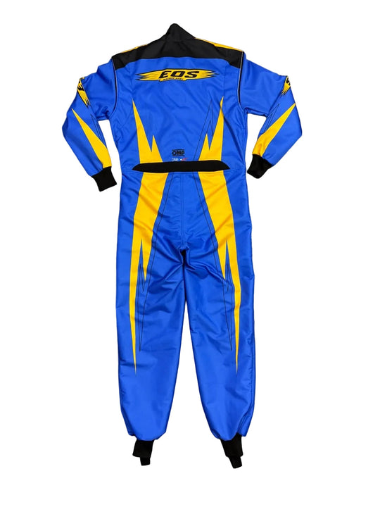 A blue and yellow full-body racing suit laid flat on a gray tiled floor. The suit features a black collar, black cuffs, a black waistband, and bold yellow lightning-bolt style graphics running down the front, with a yellow 'BOS' logo on the upper back.