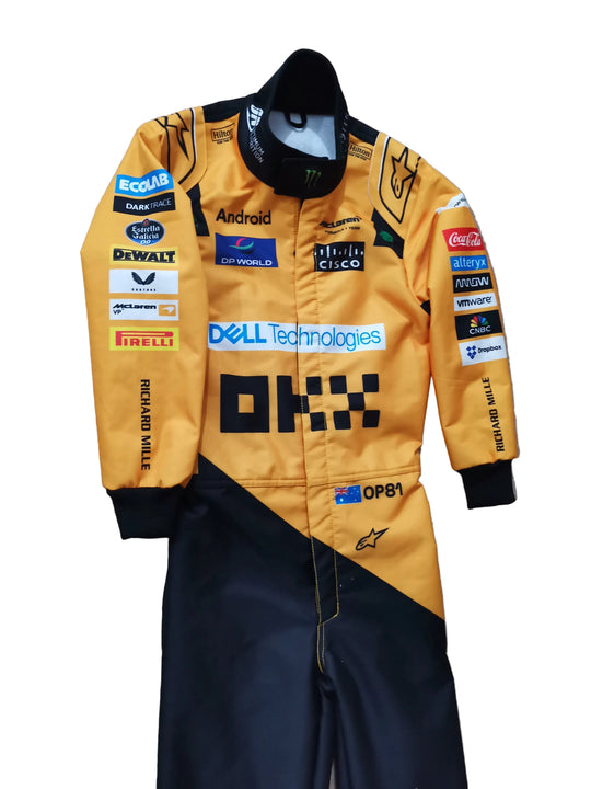 Yellow racing suit with various sponsor logos on a textured surface