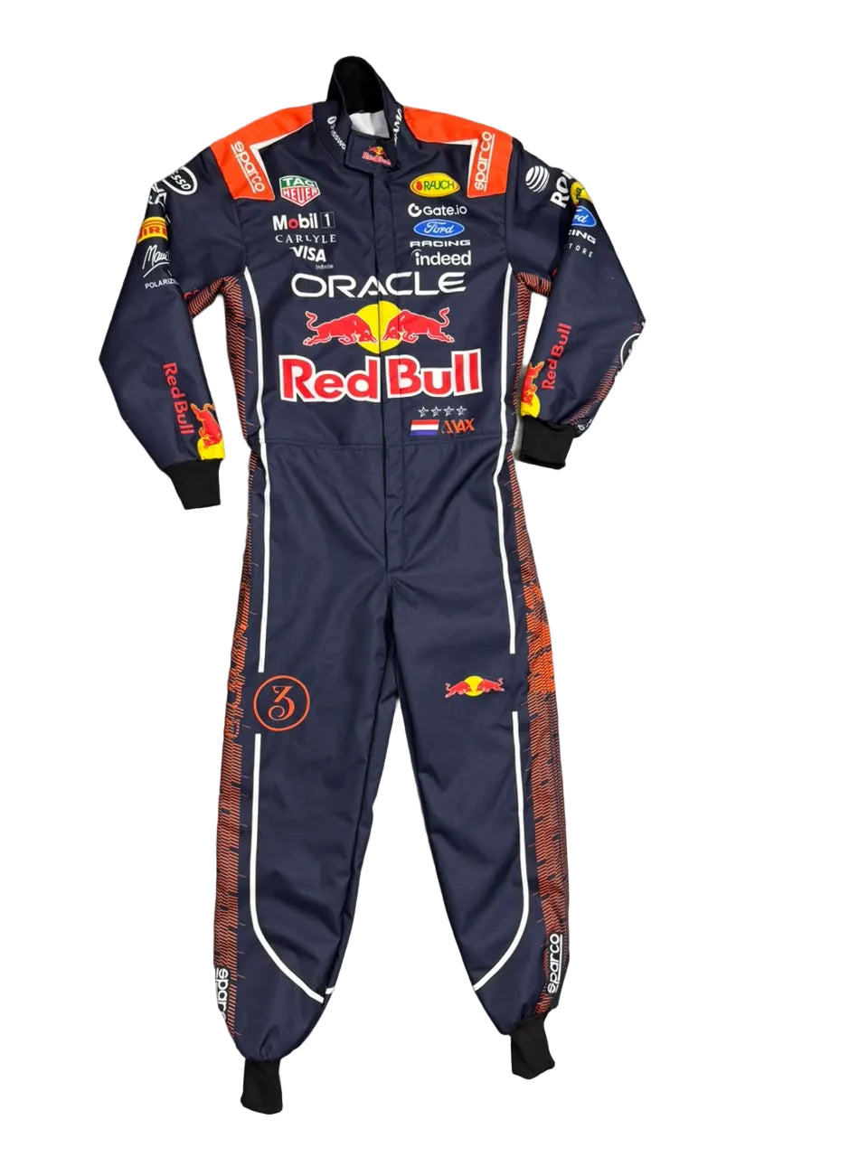 A full Oracle Red Bull Racing driver's racing suit is laid flat on a gray tiled floor. The suit is navy blue with prominent red, orange, and white sponsor logos and graphics, including Red Bull, Oracle, Mobil 1, Castor, and Ford.