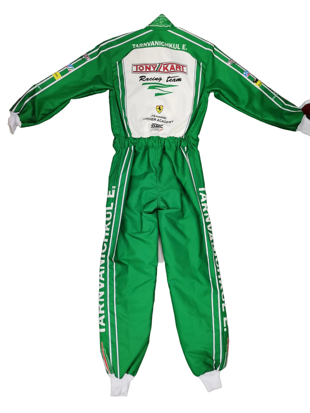 A green and white racing suit laid flat against a white background, featuring the back view with sponsor logos including Lony Karl Racing Team and Ferrari.
